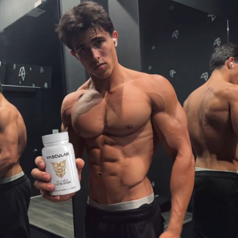 Athlete holding VASCULAR bottle